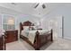 Spacious main bedroom featuring a carved wood bed, dresser, and an en-suite bathroom with a glass shower at 5225 Mcchesney Dr, Charlotte, NC 28269