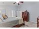Comfortable main bedroom showcasing a carved wood bed, dresser, and closet, offering a tranquil atmosphere at 5225 Mcchesney Dr, Charlotte, NC 28269