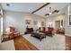 Spacious living room with hardwood floors, ceiling fan, and a view into other living areas at 615 Reliance Ct, Tega Cay, SC 29708