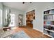 Cozy office space with hardwood floors, a cactus, and a view into other living areas at 615 Reliance Ct, Tega Cay, SC 29708