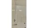 Close-up of the shower and tub area of a bathroom with acrylic surround at 6512 Quarterbridge Ln, Charlotte, NC 28262