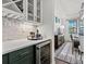Chic bar area with wine storage, beverage cooler, and modern finishes at 6707 Baker Creek Ave, Indian Land, SC 29707