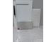 Collection of white cabinet, counter top, and tile samples at 6707 Baker Creek Ave, Indian Land, SC 29707