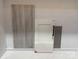 Samples of wood-look flooring, white cabinets, white counter tops, and gray tile at 6707 Baker Creek Ave, Indian Land, SC 29707