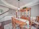 Cozy dining room with hardwood floors, and modern lighting fixture at 7138 Dove Field Ln, Indian Land, SC 29707