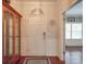 Inviting entryway featuring hardwood floors, a front door, and decorative accents at 7138 Dove Field Ln, Indian Land, SC 29707