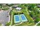 Aerial view of community amenities, including tennis courts, a pool, and a playground at 8313 Balcony Bridge Rd, Huntersville, NC 28078