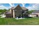 Spacious backyard with a covered patio and plenty of room for outdoor activities at 8313 Balcony Bridge Rd, Huntersville, NC 28078