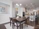 Charming dining room adjacent to a well-equipped kitchen and a convenient pantry at 8313 Balcony Bridge Rd, Huntersville, NC 28078