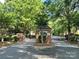 Gated community entrance offers security and curb appeal with brick facade at 8623 Tullamore Park Cir, Charlotte, NC 28226