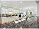 Well-equipped kitchen featuring sleek countertops, modern appliances, and an open view to the dining area at 8623 Tullamore Park Cir, Charlotte, NC 28226