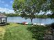 Lakeside community area with boats and gazebo, offering a serene waterfront setting at 8623 Tullamore Park Cir, Charlotte, NC 28226