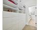 Large walk-in closet featuring an abundance of shelving and drawers, providing ample storage space at 8623 Tullamore Park Cir, Charlotte, NC 28226