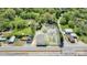 Overhead of the building highlighting property lines and close proximity to lush landscape at 8974, 8972 & 8970 Nc 90 E Hwy, Stony Point, NC 28678