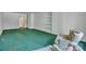Well-lit living room showcasing built-in shelves, paneled walls, and a comfortable seating area at 8974, 8972 & 8970 Nc 90 E Hwy, Stony Point, NC 28678