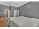Bedroom showcasing neutral walls, carpet floors and white trim at 9032 Cornflower Dr, Harrisburg, NC 28075