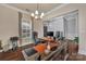 Well-lit home office with hardwood floors and a spacious desk area at 9032 Cornflower Dr, Harrisburg, NC 28075