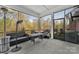 Relaxing covered patio with comfortable seating, perfect for outdoor enjoyment at 9032 Cornflower Dr, Harrisburg, NC 28075