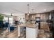 Open floor plan featuring a modern kitchen, an island with barstools, and an adjacent living area at 980 Lakeland Ave, Lincolnton, NC 28092