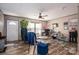 Cozy living room with wood-look flooring, comfortable seating, and natural light at 980 Lakeland Ave, Lincolnton, NC 28092