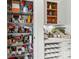 Walk-in pantry and coffee bar area with shelving and a beverage center at 10609 Washam Potts Rd, Cornelius, NC 28031