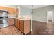 Stylish kitchen with stainless steel appliances and ample counter space open to dining area at 10720 Hill Point Ct, Charlotte, NC 28262