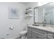 Modern bathroom featuring a shower, toilet, vanity with storage, and a framed mirror at 1121 Rembrandt Sw Dr, Concord, NC 28027