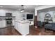 Modern kitchen features granite counters, a stainless steel oven, and white cabinets at 1121 Rembrandt Sw Dr, Concord, NC 28027