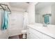 Clean bathroom boasts modern vanity, large mirror, and tub-shower combo with stylish fixtures at 123 Abersham Dr, Mooresville, NC 28115