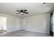 Bright bedroom with ceiling fan, neutral walls and carpet at 123 Abersham Dr, Mooresville, NC 28115