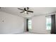 Spacious bedroom with ceiling fan, neutral walls and carpet at 123 Abersham Dr, Mooresville, NC 28115