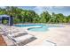 Large community pool with ample lounge chairs, offering a relaxing and luxurious amenity for residents at 123 Abersham Dr, Mooresville, NC 28115