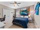 This bedroom features a queen bed, lots of closet space, and a ceiling fan at 1320 Huntcliff Dr, Waxhaw, NC 28173