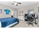 This bedroom features neutral colored walls, carpeted floors, and a ceiling fan at 1320 Huntcliff Dr, Waxhaw, NC 28173