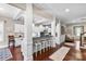 Open-concept kitchen with an island and bar seating, perfect for entertaining guests at 1320 Huntcliff Dr, Waxhaw, NC 28173