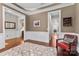 Inviting living area showcasing an open doorway, neutral walls with white trim, and hardwood floors at 1320 Huntcliff Dr, Waxhaw, NC 28173