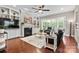 Inviting living room with a fireplace, built-in shelving, and sliding doors to the outdoor patio at 1320 Huntcliff Dr, Waxhaw, NC 28173