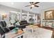 Spacious living room with comfortable seating, hardwood floors, and an open layout at 1320 Huntcliff Dr, Waxhaw, NC 28173