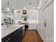 Bright kitchen featuring white cabinetry, subway tile backsplash, stainless steel appliances, and a functional center island at 1328 Astoria Pkwy, Catawba, NC 28609