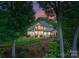 Stately home featuring manicured lawn, wrought iron fencing and a multi-level terrace perfect for outdoor living at 1328 Astoria Pkwy, Sherrills Ford, NC 28673