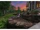 Beautiful waterfall feature adding natural ambiance to this landscaped property at 1328 Astoria Pkwy, Sherrills Ford, NC 28673