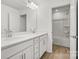Bathroom featuring double sink vanity with chrome fixtures at 13756 Roderick Dr # 176, Huntersville, NC 28078