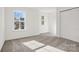 Bedroom featuring neutral walls, carpet, natural light, and closet at 13756 Roderick Dr # 176, Huntersville, NC 28078