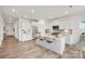 Modern, well-lit kitchen featuring stainless steel appliances, a center island, and ample cabinet space at 13756 Roderick Dr # 176, Huntersville, NC 28078