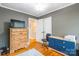 Bedroom showcases ample closet space, great lighting, and hardwood floors at 1400 Fern Forest Dr, Gastonia, NC 28054