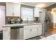Kitchen featuring granite countertops, stainless steel appliances, and ample cabinet space at 1400 Fern Forest Dr, Gastonia, NC 28054