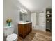 Bathroom with hardwood floors, a vanity, and a shower at 141 Hickory Creek Dr, Gastonia, NC 28052
