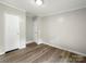 Bedroom with wood flooring and white doors at 141 Hickory Creek Dr, Gastonia, NC 28052
