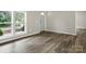 Entry way featuring modern laminate floors, neutral paint and a backyard view at 141 Hickory Creek Dr, Gastonia, NC 28052