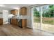 Kitchen with stainless steel appliances and a sliding glass door to the deck at 141 Hickory Creek Dr, Gastonia, NC 28052